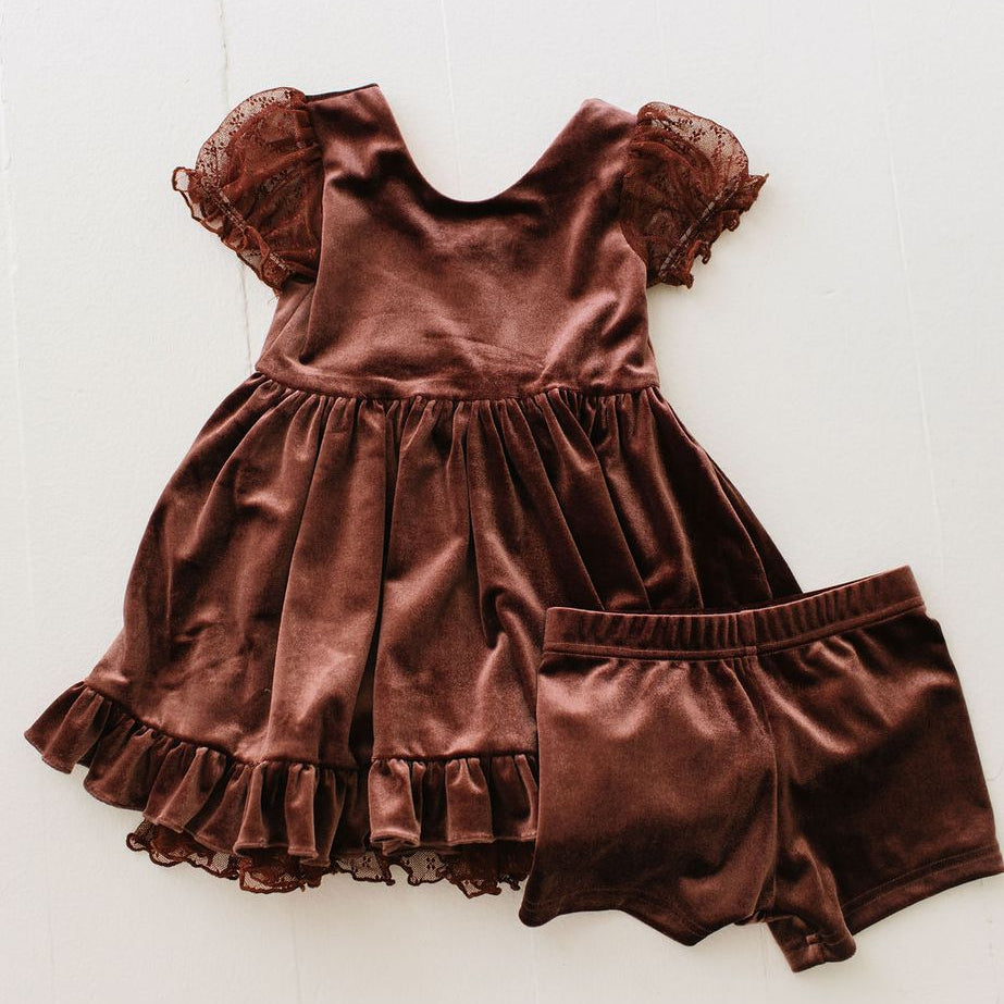 Brown velvet dress with matching bloomers on a white background