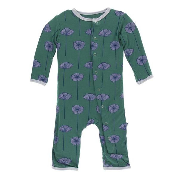 Green baby onesie with purple floral pattern on a white background