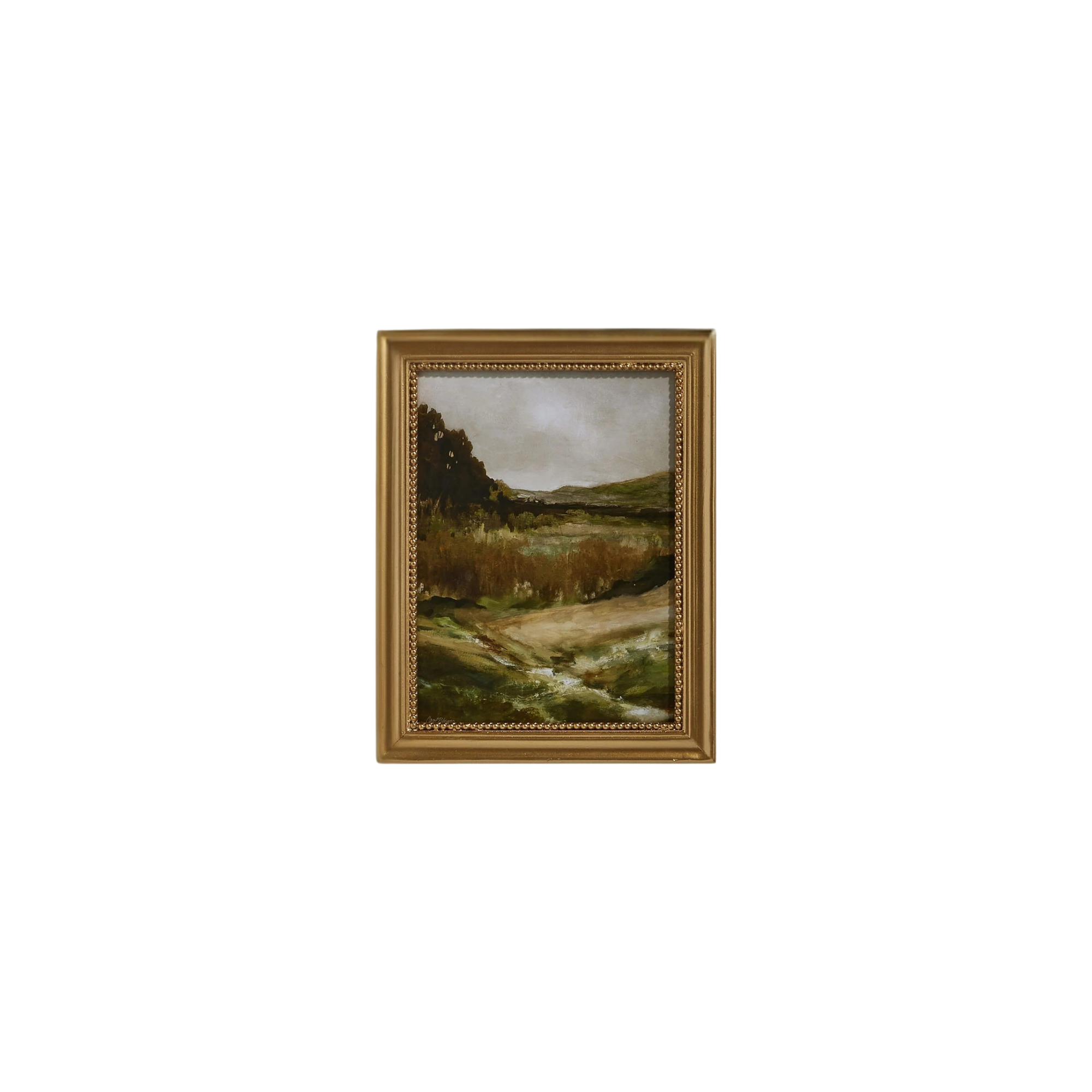Framed landscape painting on a white background