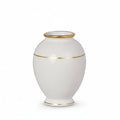 Three white vases with gold rims on a white background