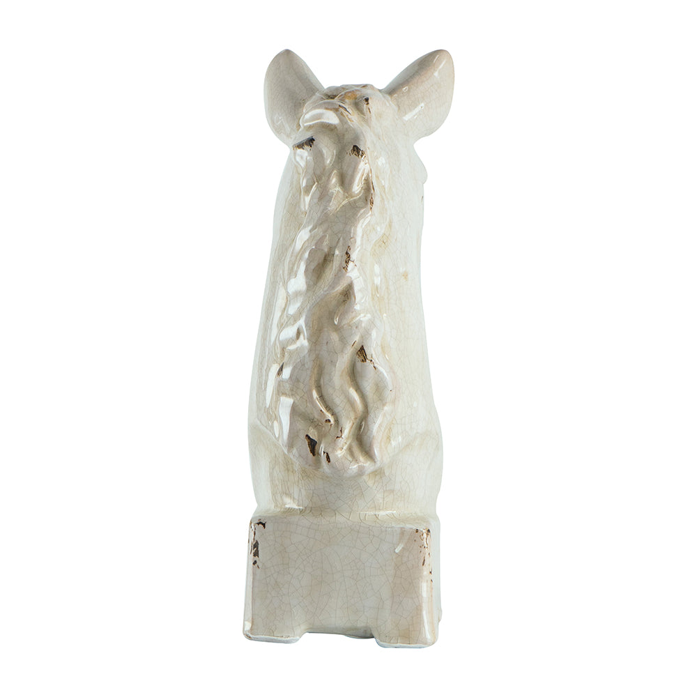 Decorative horse head sculpture on a white background