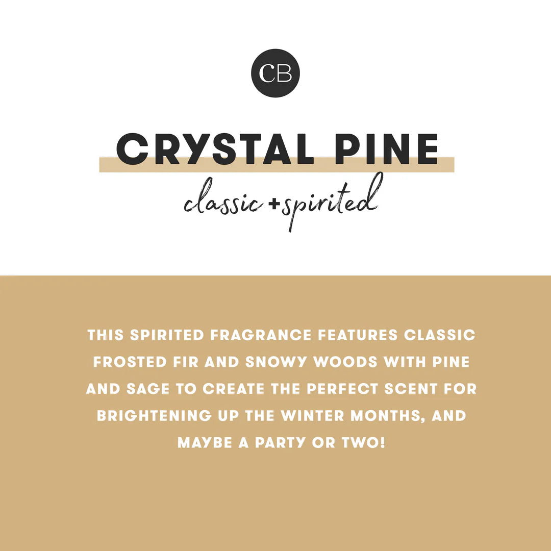 Product label for 'Crystal Pine' fragrance with brand logo and description.