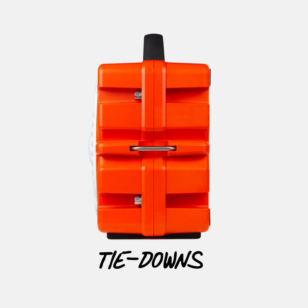 Turtlebox Grande speaker in orange side view highlighing the tie-downs #speaker-color_orange