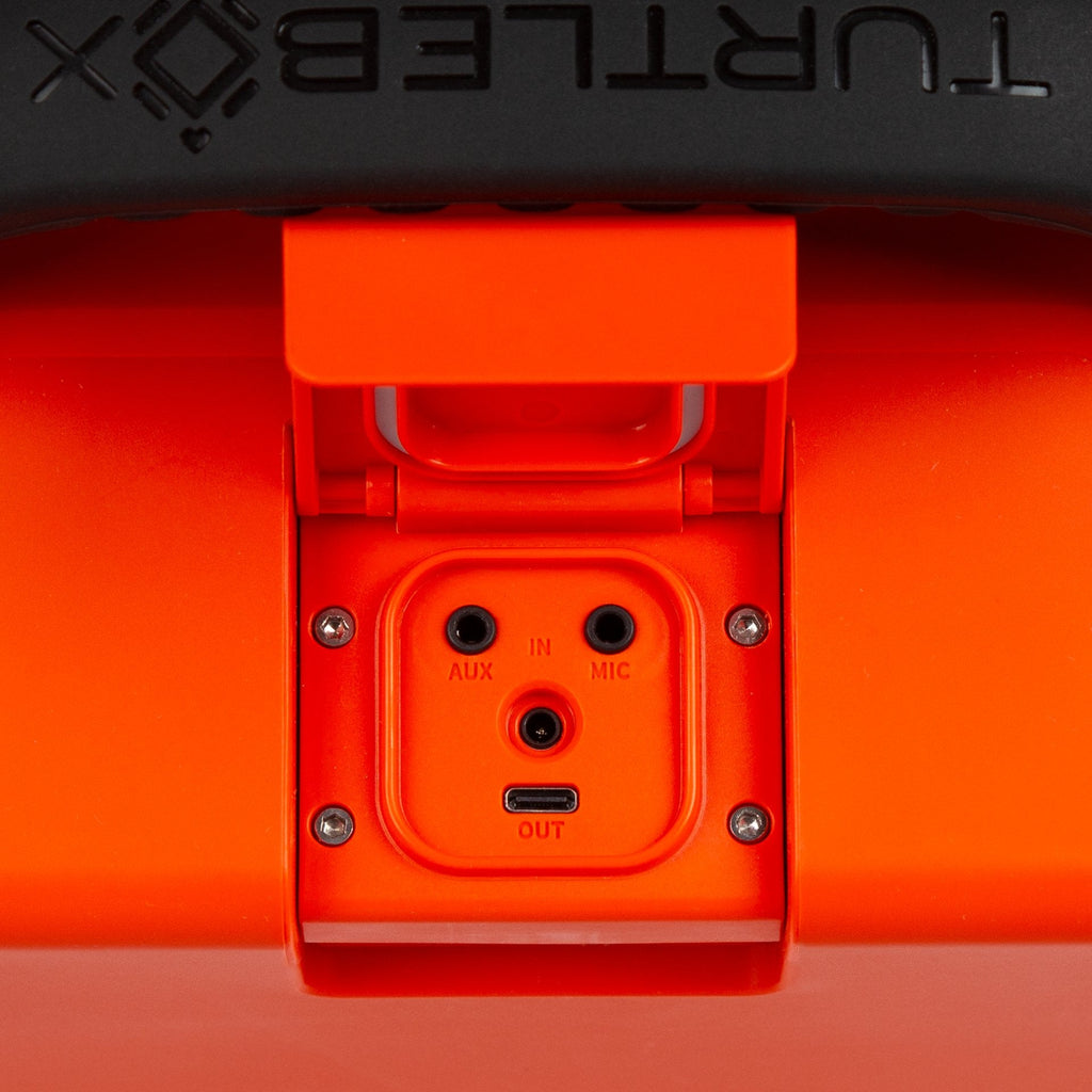 Turtlebox Grande speaker in orange port view #speaker-color_orange