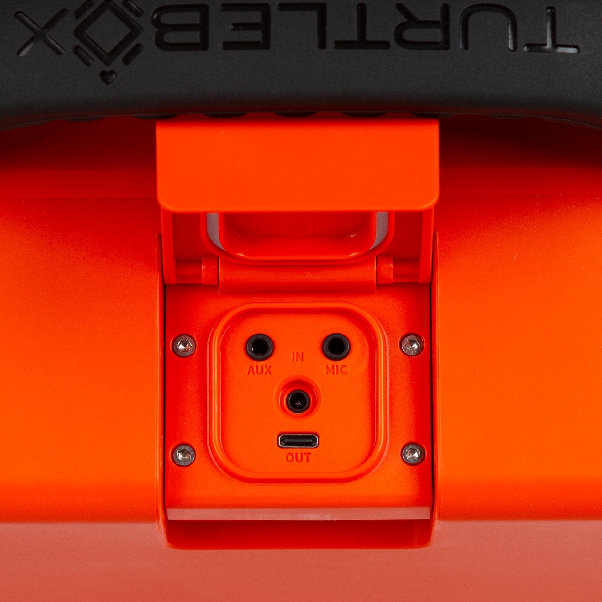 Turtlebox Grande speaker in orange port view #speaker-color_orange