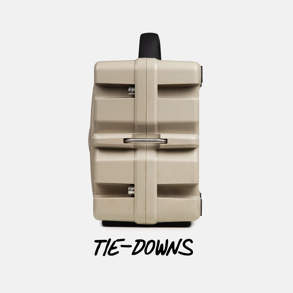 Turtlebox Grande speaker in tan side view highlighing the tie-downs #speaker-color_tan