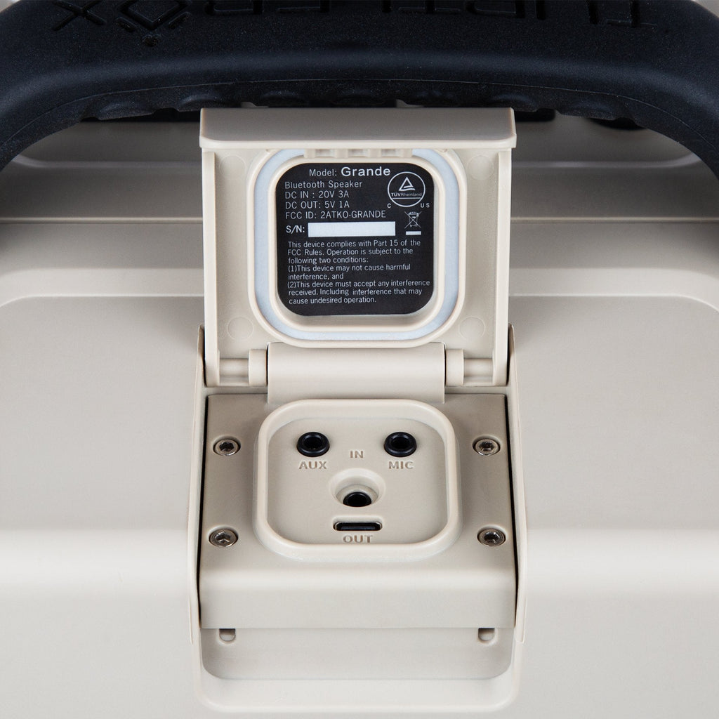 Turtlebox Grande speaker in tan port view #speaker-color_tan