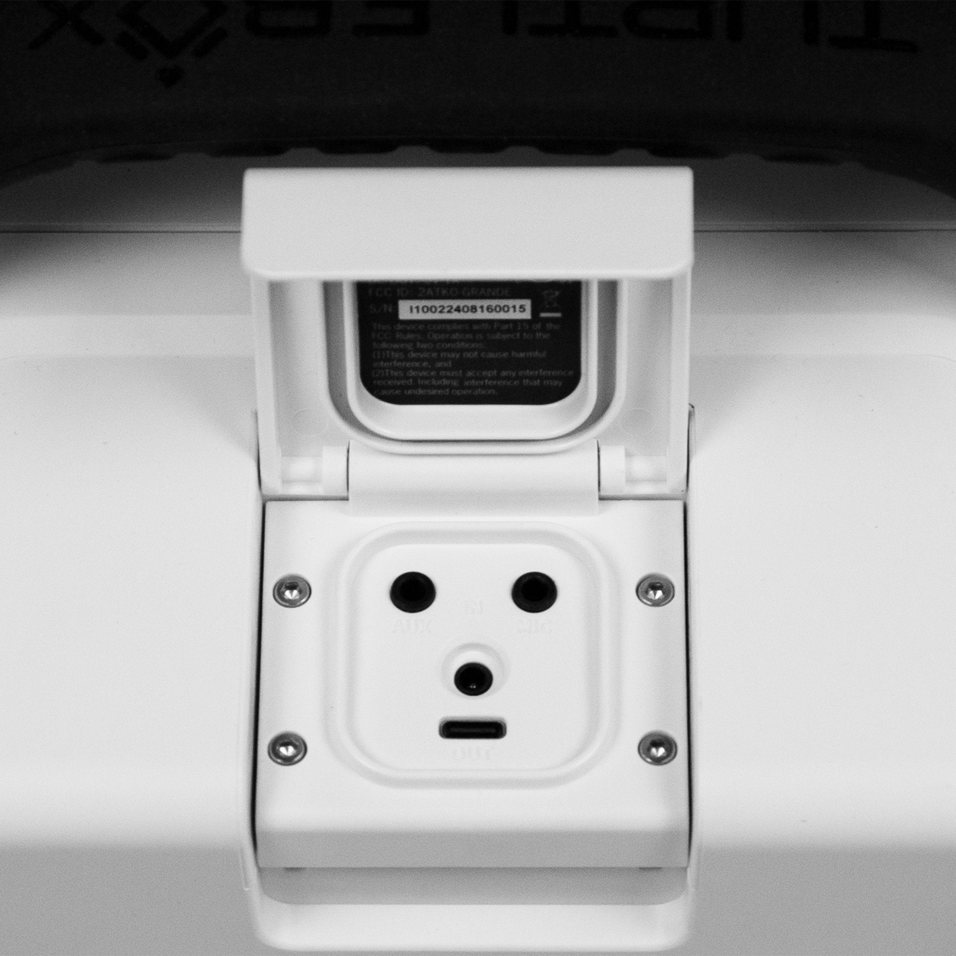 Turtlebox Grande speaker in white port view #speaker-color_white #base-color_guy-harvey-artist-series