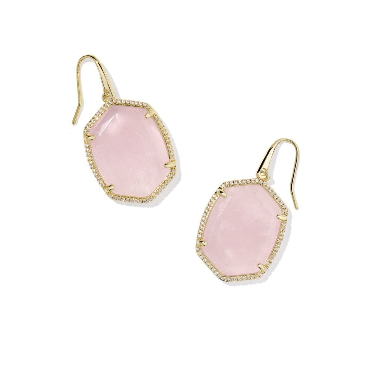 Pair of pink stone earrings with gold frames on a white background