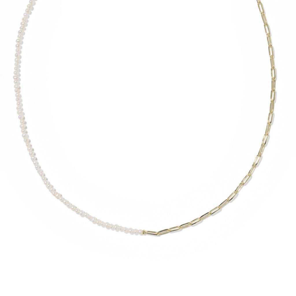 Gold necklace on a white background