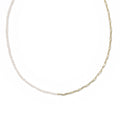 Gold necklace on a white background