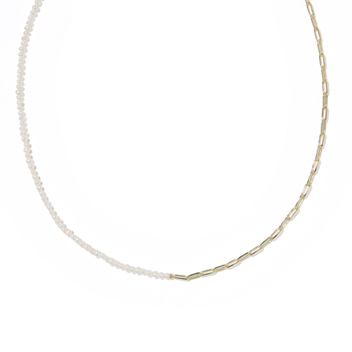 Gold necklace on a white background