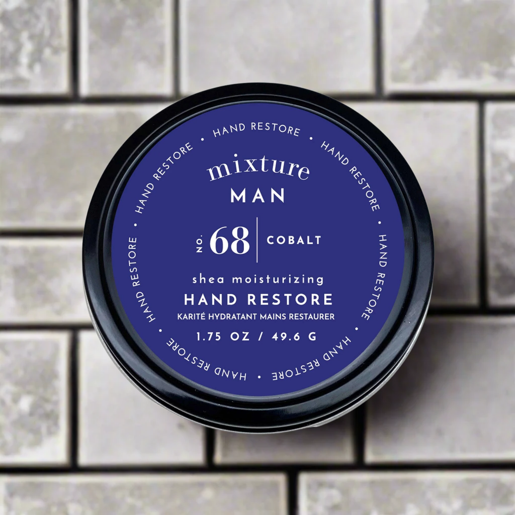 Hand restore product with blue label on a tiled background