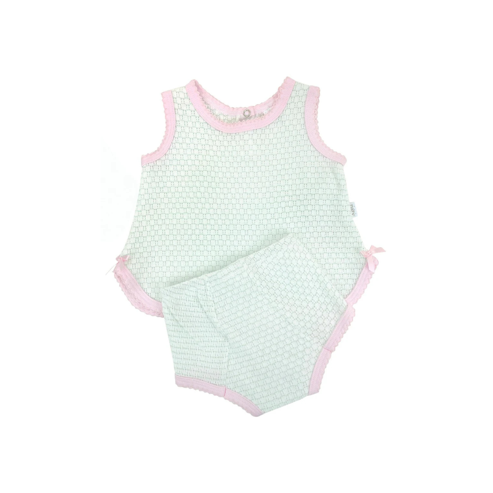 Paty Knit romper with mint pattern and pink trim on a white background