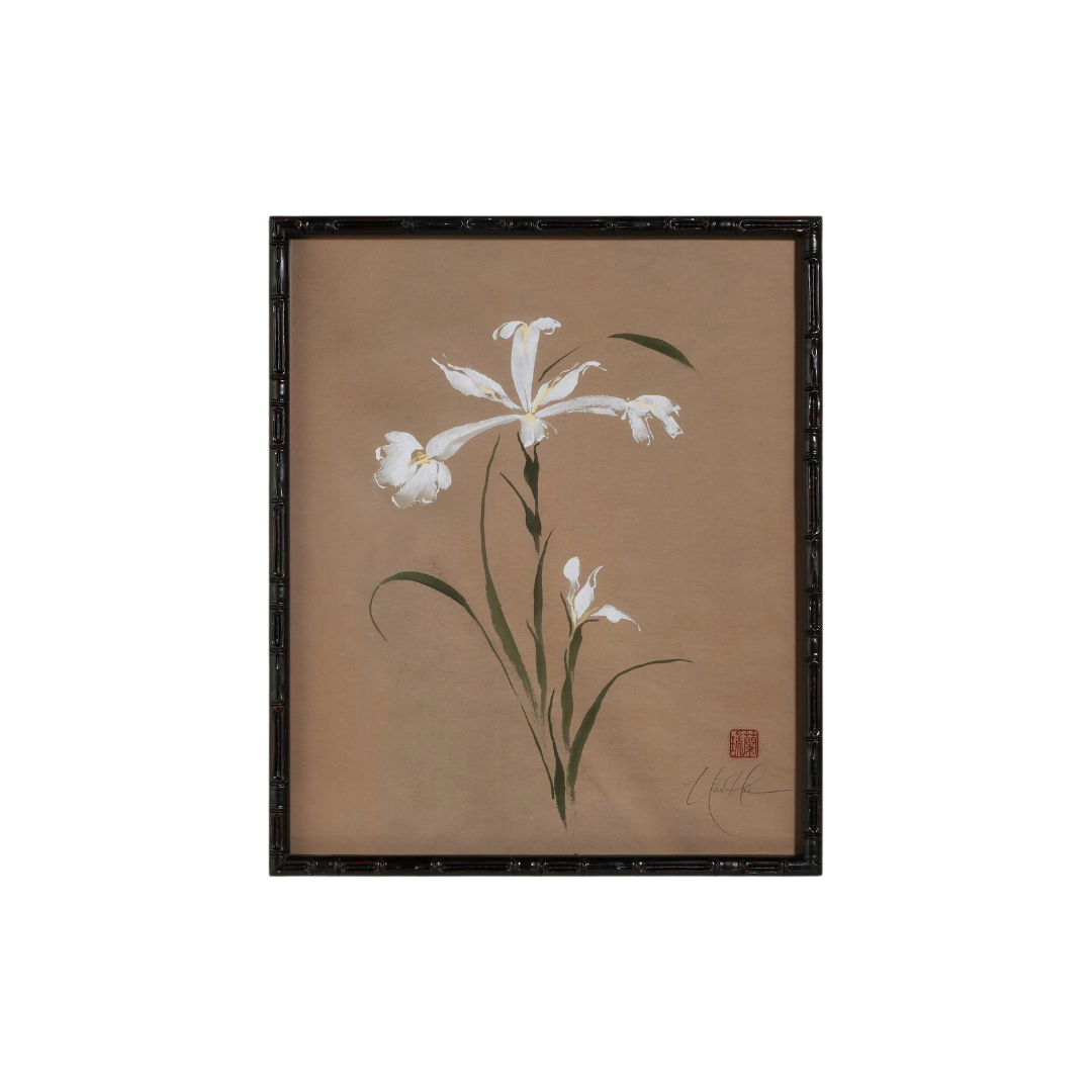 Framed artwork of a white flower on a beige background