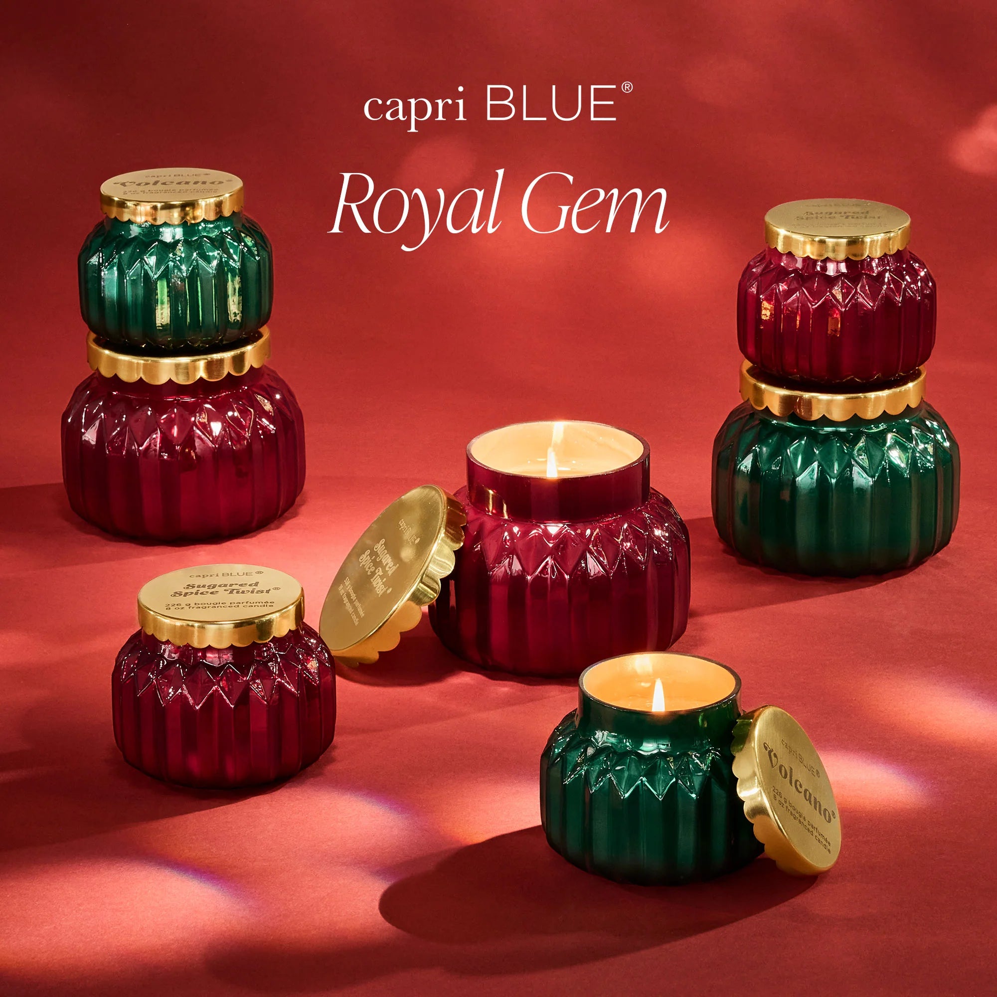 capri BLUE Royal Gem candles on a red background