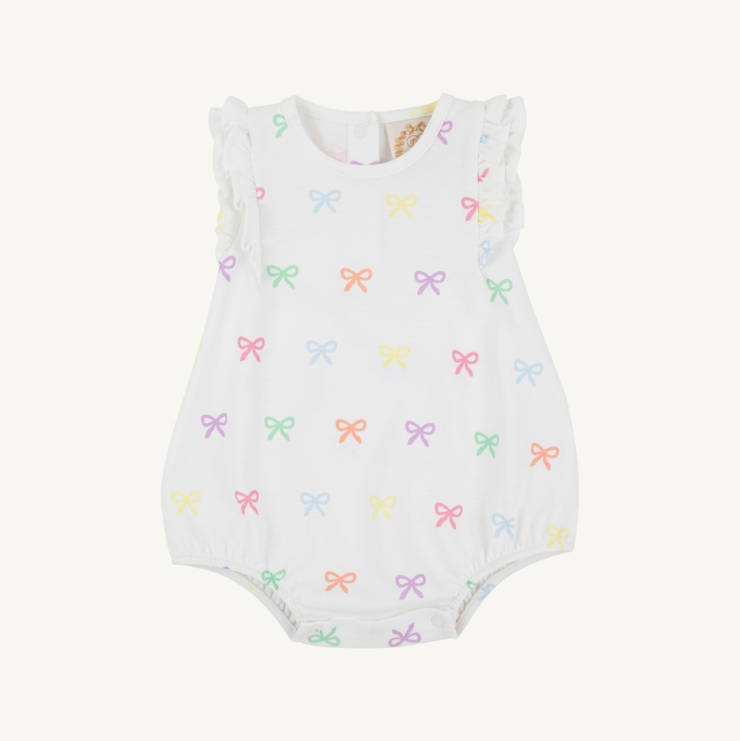 The Beaufort Bonnet Company White baby romper with colorful bow pattern on a white background