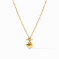 Gold necklace with a round pendant on a white background