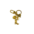 Gold keychain with boot and horse design on a white background