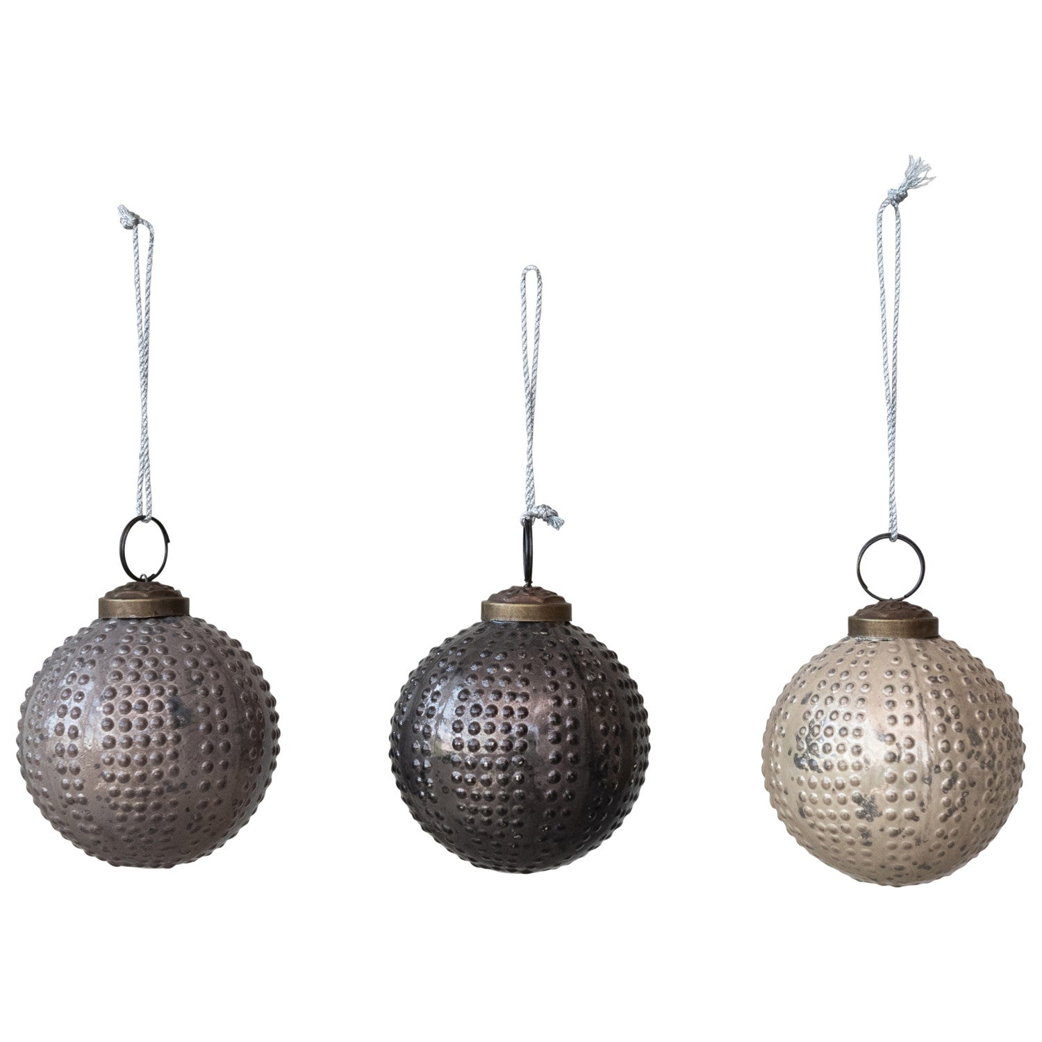 Three textured hanging ornaments on a white background