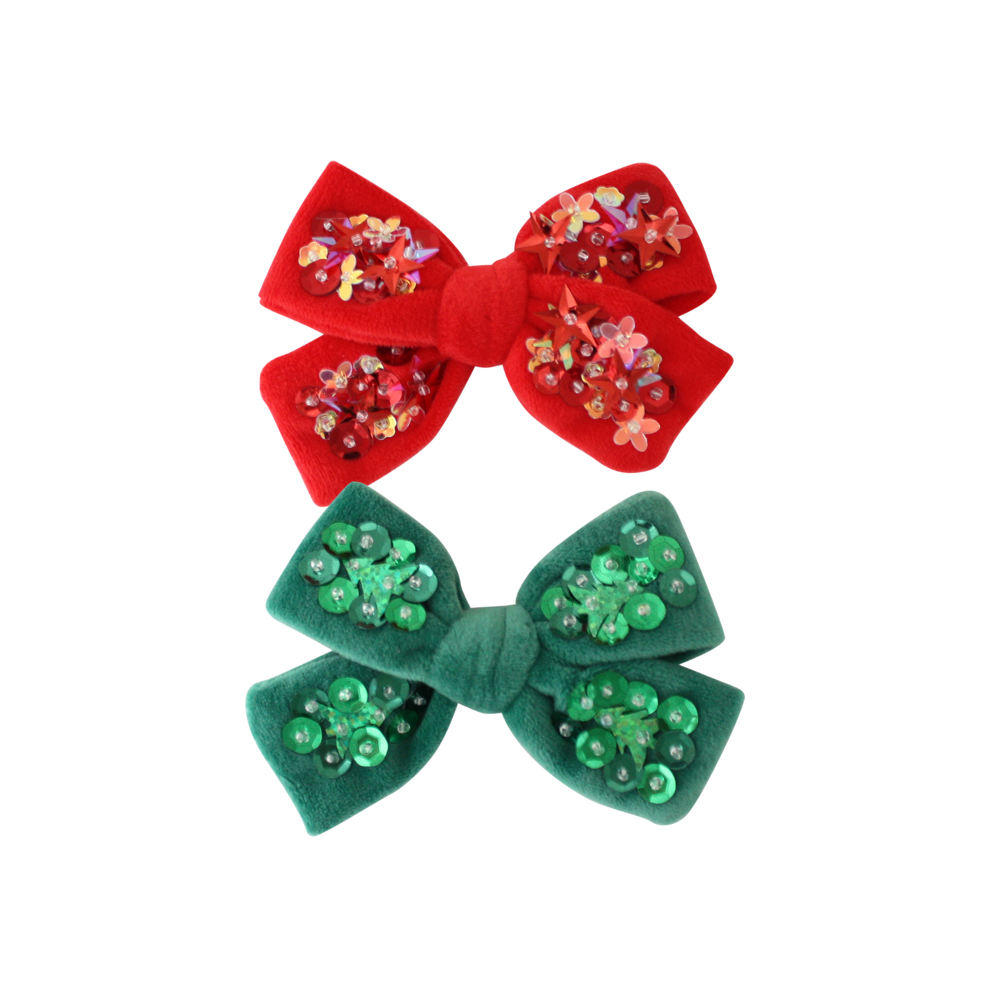 Red and green hair bows with sequin details on a white background