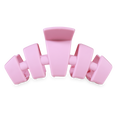 Pink hair clip on a white background