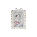 Decorative photo frame with a swan design on a white background