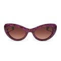 Cute cat-eye sunglasses with a purple and black marbled acetate frame and brown gradient lenses, shown against a plain white background.