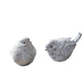 Two stone bird sculptures